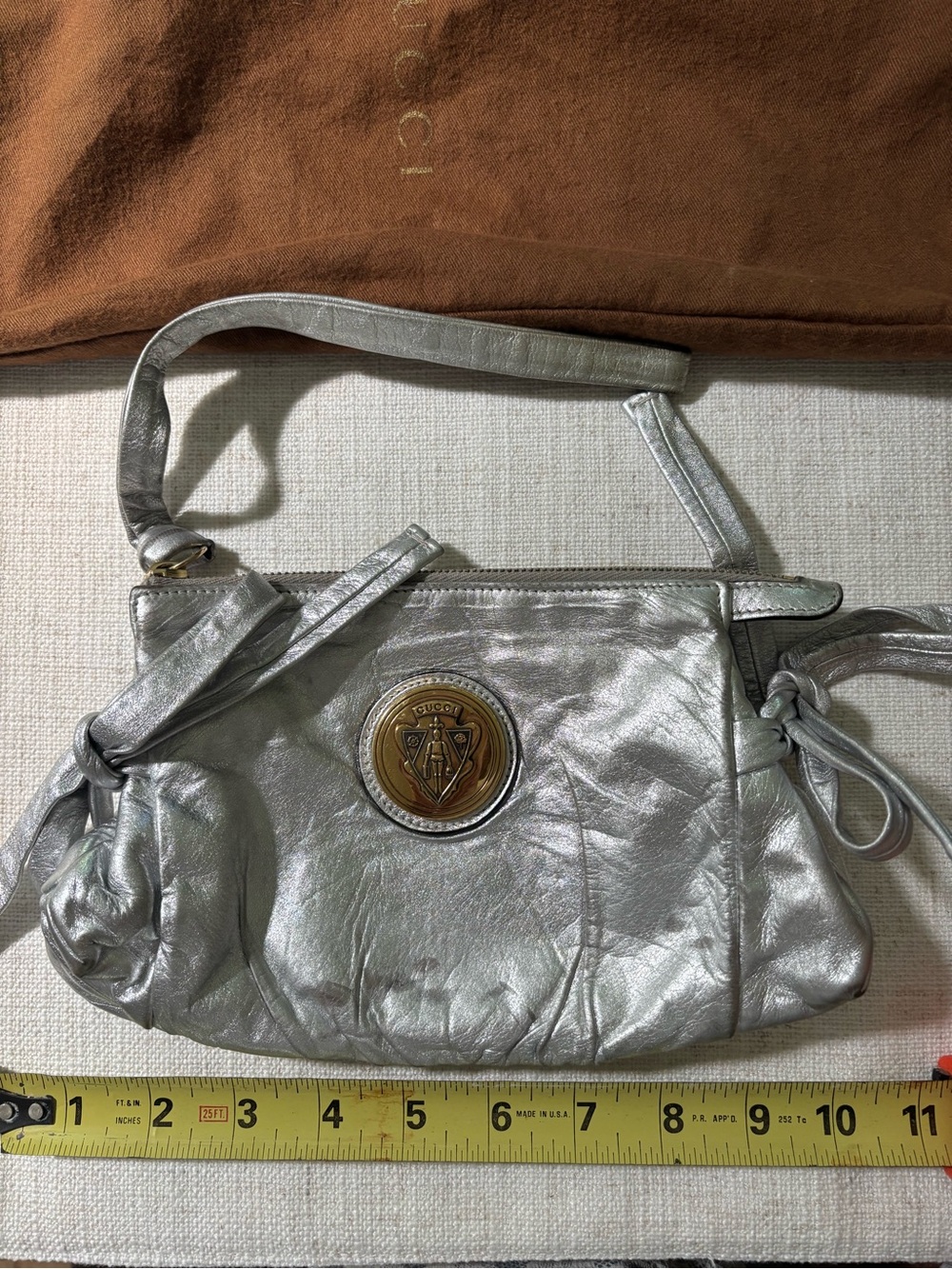 Gucci Metallic Silver Mini Shoulder Bag with Gold Emblem